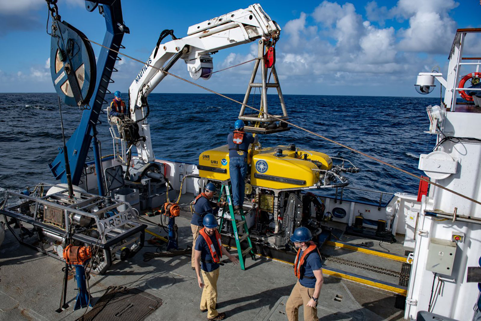 Launching of the ROV Hercules from the E/V Nautilus in its search for meteorite fragments.
